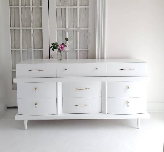 White Mid-Century Dresser with Curved Drawer Fronts and Tapered Legs