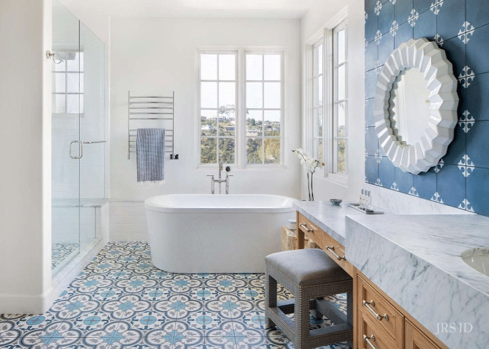 Bathroom Blue Patterned Tile Wood Vanity Marble Top Fluted Mirror Freestanding Tub