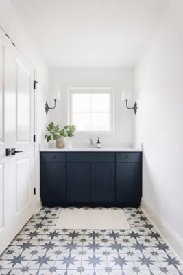 Bathroom with Star Pattern Tile Floor and Navy Vanity