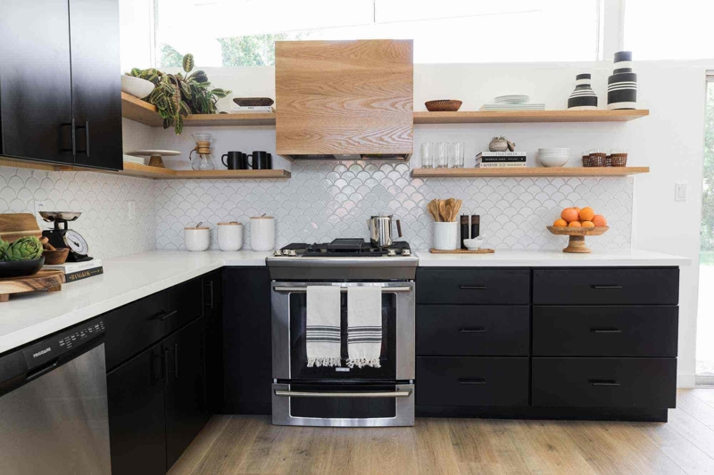 Black Kitchen Cabinets White Scalloped Backsplash Wood Range Hood