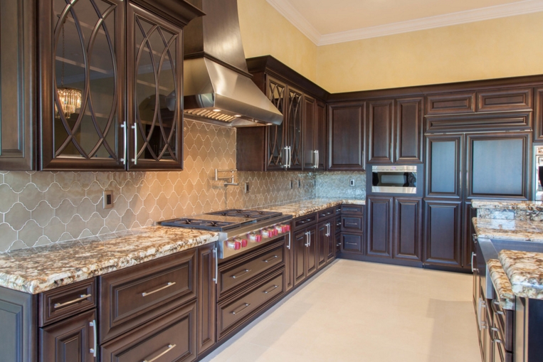 Classic Kitchen Design: Dark Wood Cabinets, Arabesque Tile Backsplash