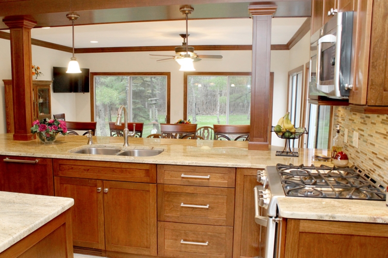 Classic Kitchen Layout: Wood Cabinetry, Architectural Columns