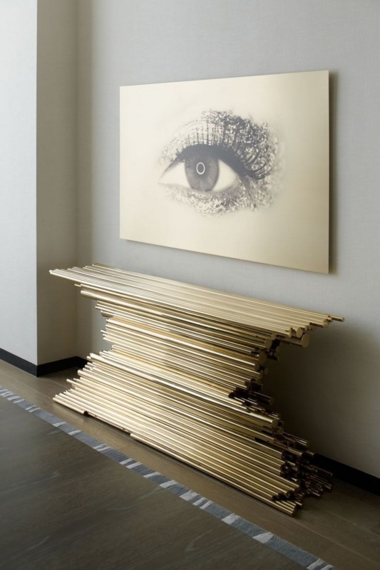 Console Table with Stacked Rods Design, Metallic Finish, Glam Style.