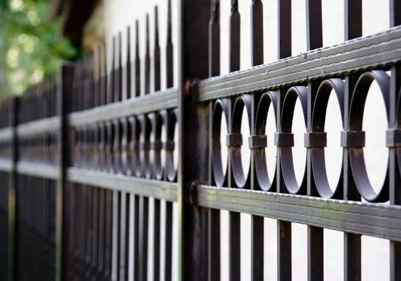 Decorative Metal Fence with Traditional Circular Motifs