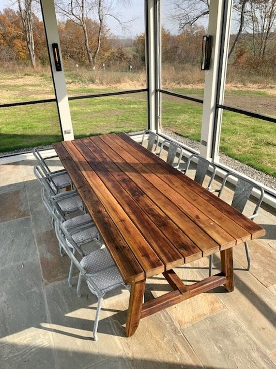 Dining Table with A-Frame Trestle Base and Industrial Metal Chairs