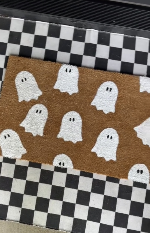 Doormat Coir Fiber Ghost Motif Layered on Checkered Rug Halloween Idea