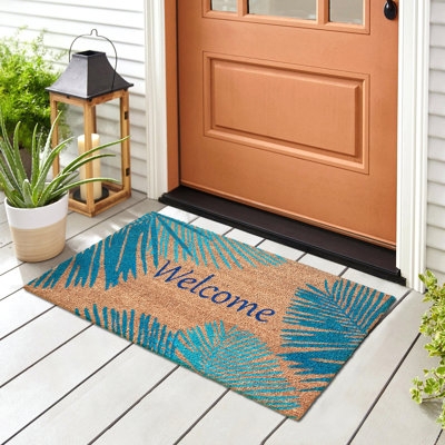 Doormat featuring Teal Palm Leaf Pattern and Welcome Text.