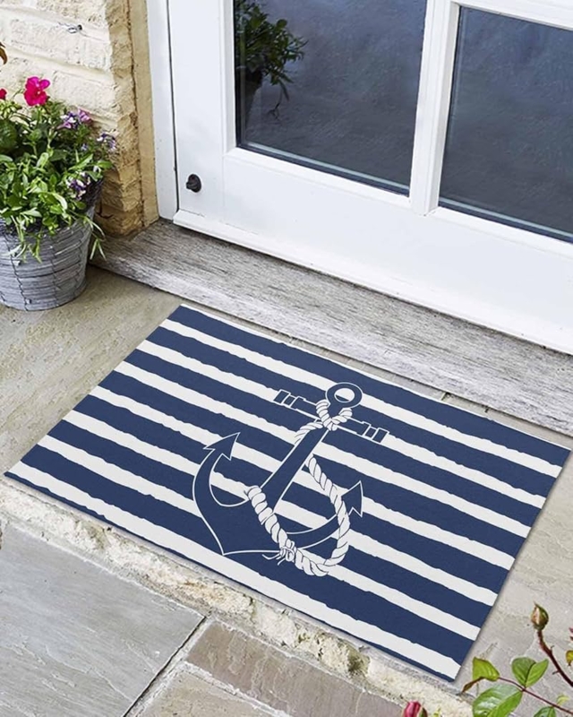 Doormat with Large Anchor Graphic and Navy White Stripes.