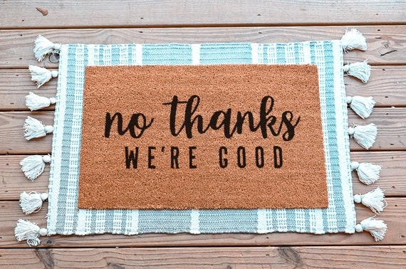 Doormat with Tasseled Base Rug & Layered Styling Idea
