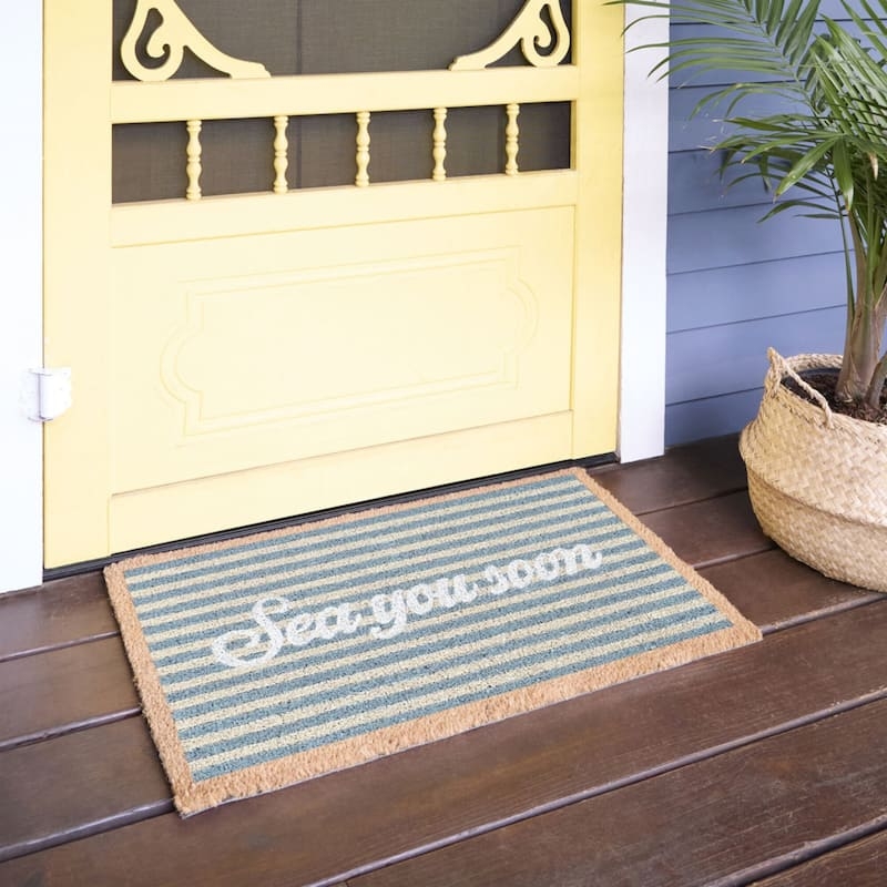 Doormat with Typography Pun "Sea You Soon" and Blue Stripes.