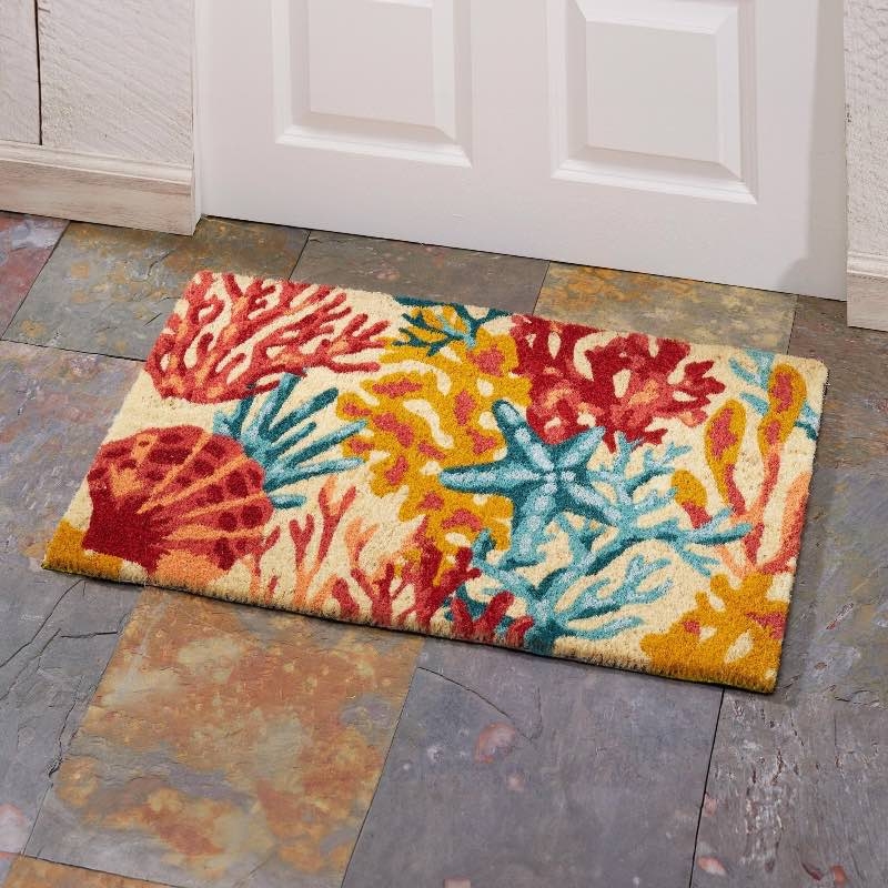 Doormat with Vibrant Coral Pattern and Multi-Colored Seaside Motif.