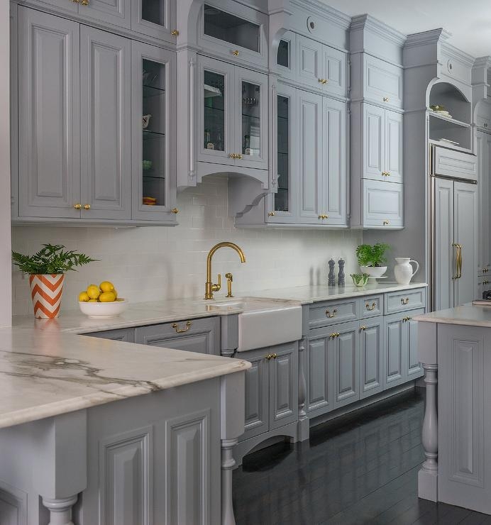 Dove Gray Kitchen Cabinets with Ebony Wood Floors & Brass Hardware
