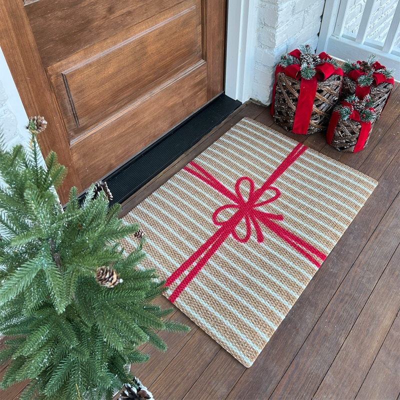 Festive Woven Doormat with Gift Wrap Design and Red Bow Motif