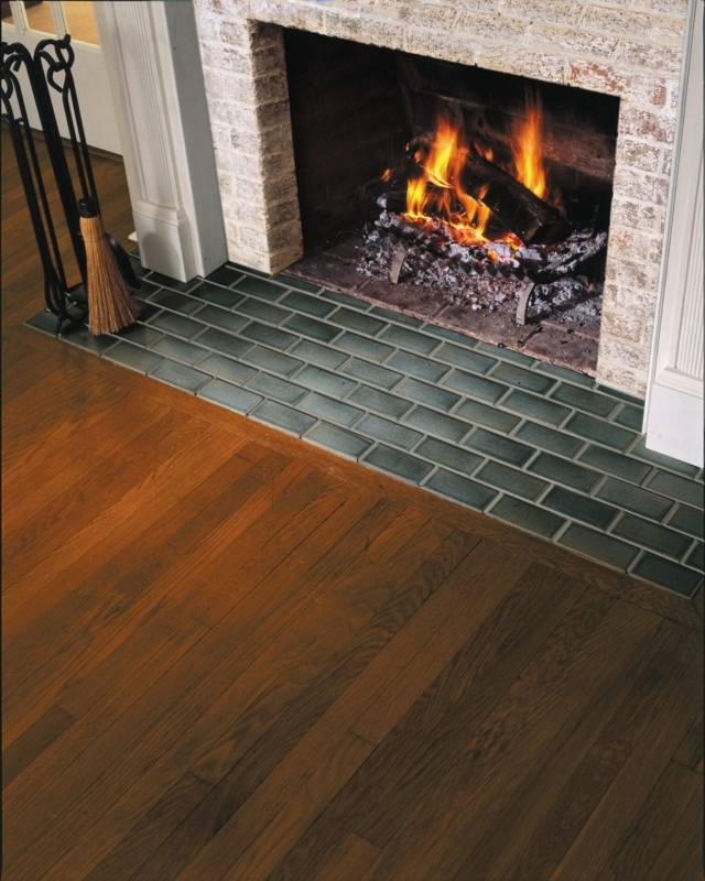 Fireplace Hearth: Traditional Brick Firebox with Teal Subway Tile