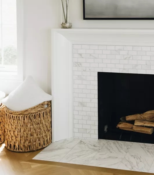 Fireplace: Marble Subway Tile Surround with Herringbone Hearth