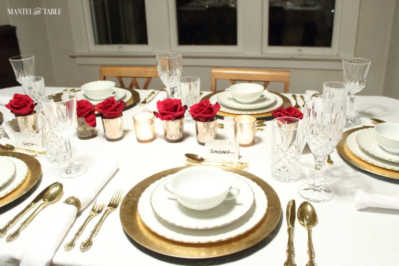 Formal Table Setting with Gold Chargers and Red Rose Centerpieces