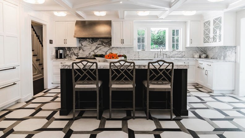 Geometric Tile Floor in Transitional Kitchen with Lattice Back Stools