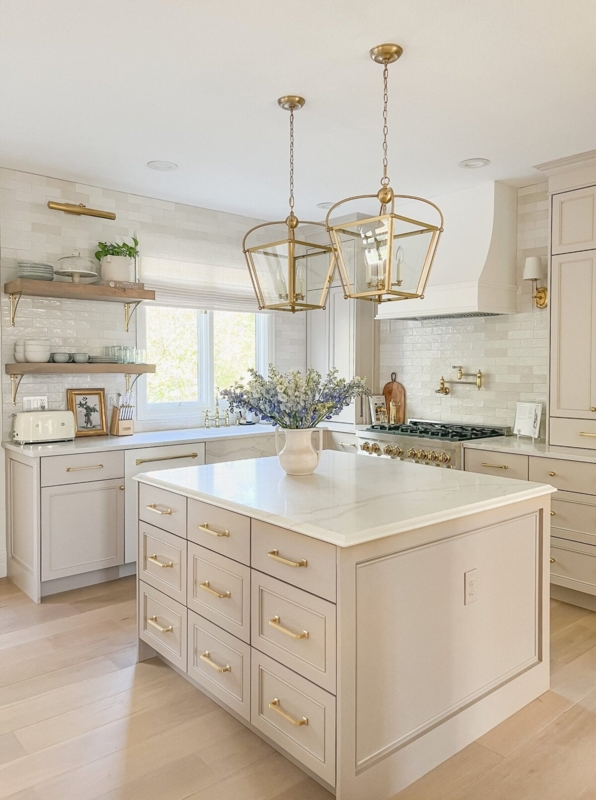 Greige Shaker Kitchen Cabinets with Brass Lantern Pendants (67 characters)
