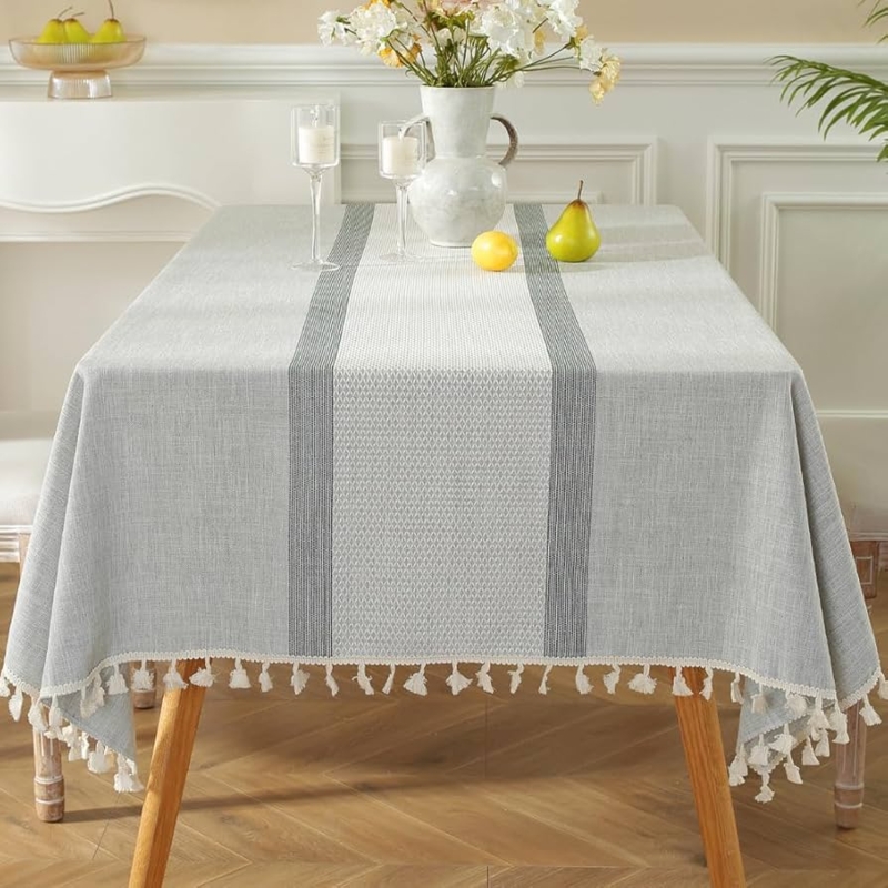 Heathered Grey Woven Tablecloth with Tassel Fringe and Central Stripe.