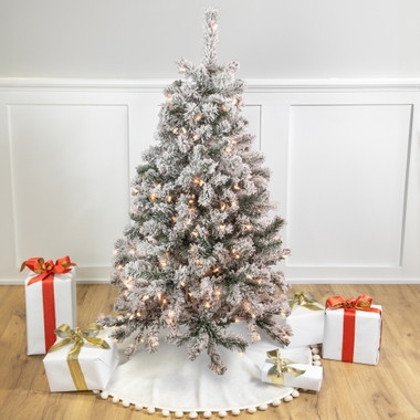 Heavily Flocked Christmas Tree with Pom Pom Skirt Warm Lights