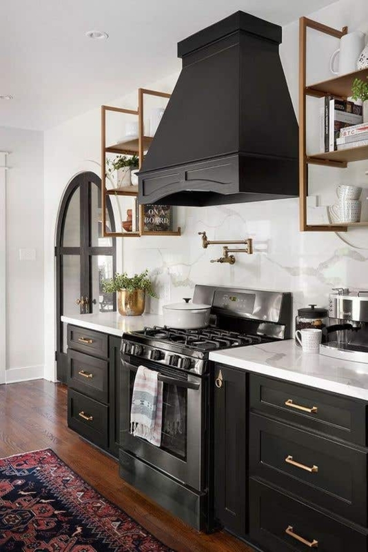 Kitchen Cabinetry Black Gold Pot Filler Arched Glass Door Marble