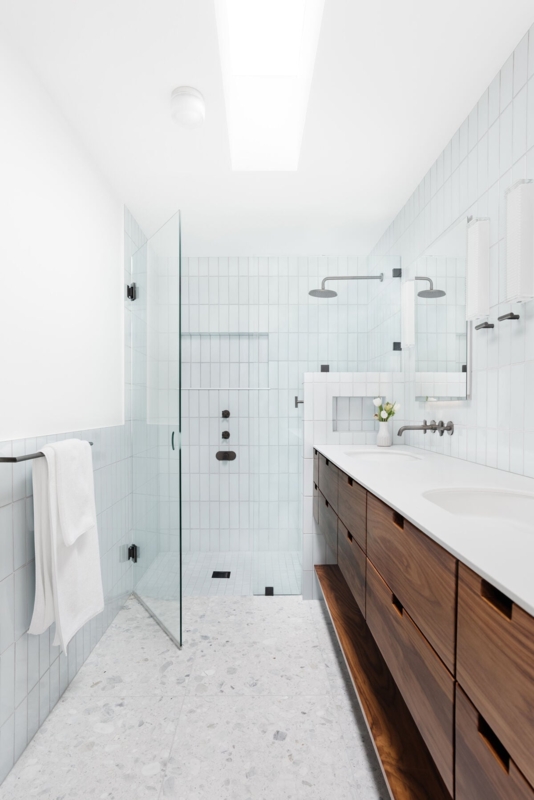 Light Blue Vertical Tile Shower Terrazzo Floor Bathroom