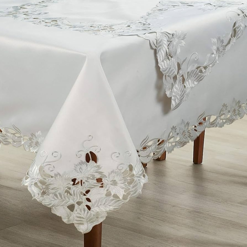 Light Gray Tablecloth with Floral Embroidery and Cutout Scalloped Edges.