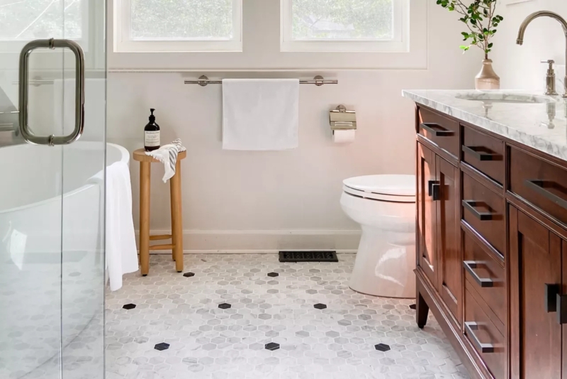 Marble-Look Hex Tile Flooring in Transitional Bathroom with Vanity