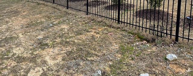 Metal Picket Fence adapted for Sloped Yard Boundary