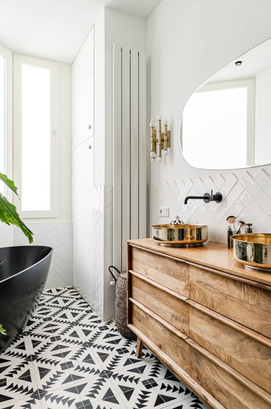 Modern Bathroom Geometric Tile Floor with Gold Vessel Sinks