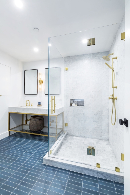 Modern Bathroom with Blue Grid Floor Tile and Gold Vanity Frame