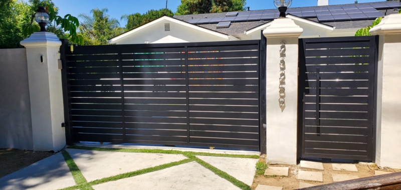 Modern Black Driveway Gate and Matching Pedestrian Gate Set