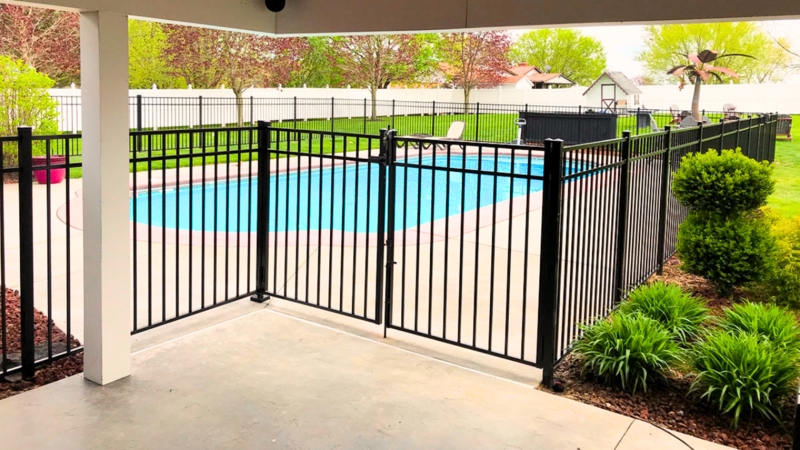 Modern Black Metal Pool Safety Gate with Vertical Slats