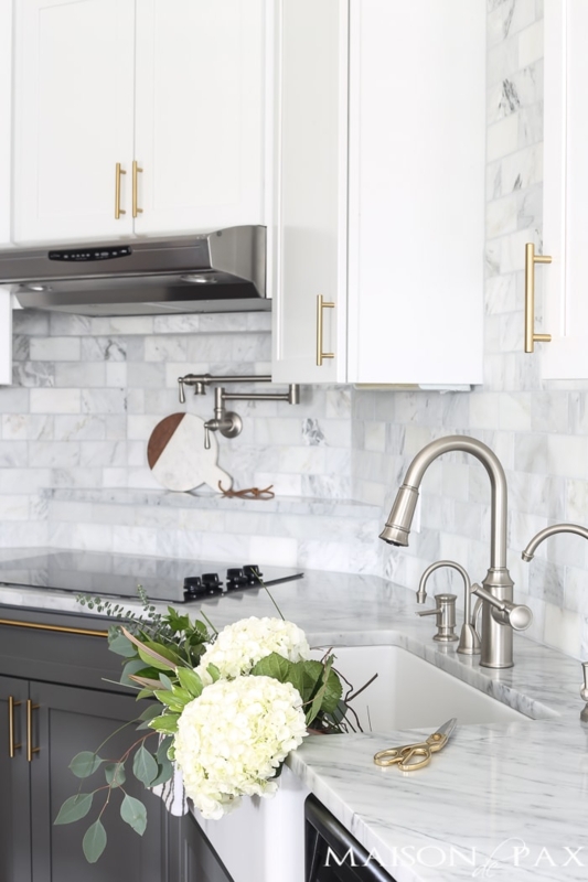 Modern Classic Two Tone Kitchen with Mixed Metal Hardware and Marble Tile
