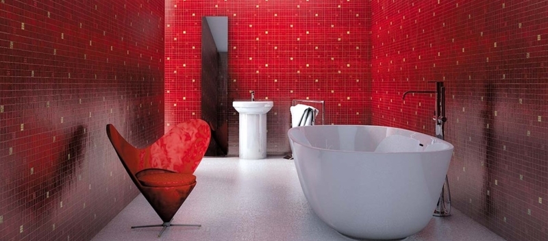 Monochromatic Red Mosaic Bathroom Tile with Sculptural Accent Chair