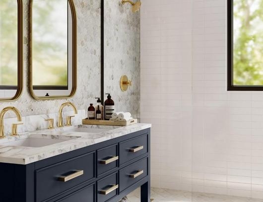 Navy Blue Double Vanity with Gold Hardware and Mixed Tile Walls