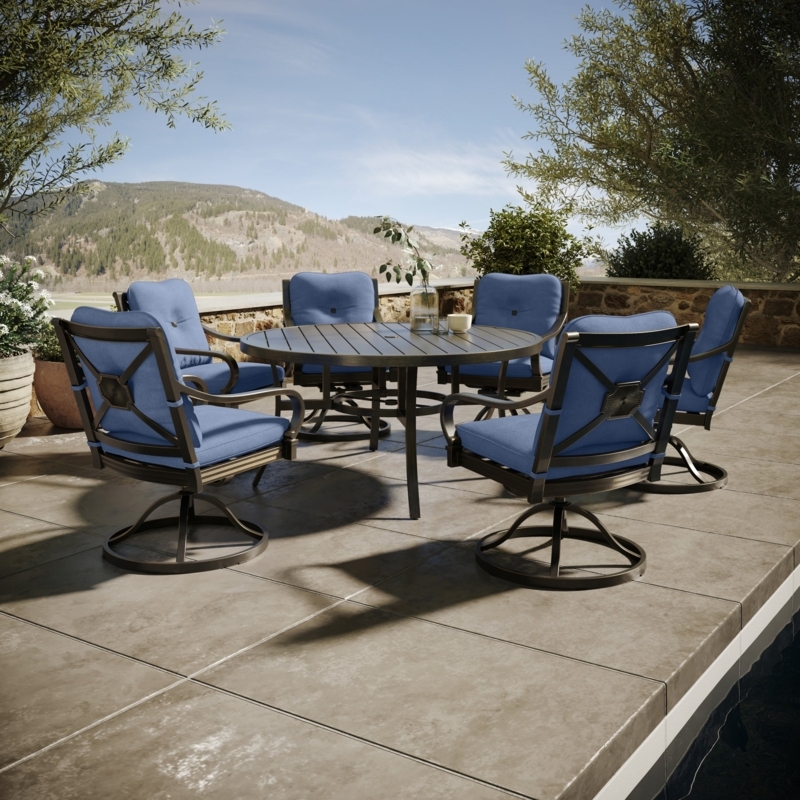 Outdoor Dining Set: Dark Bronze Swivel Rockers, Blue Cushions, Slat Top.