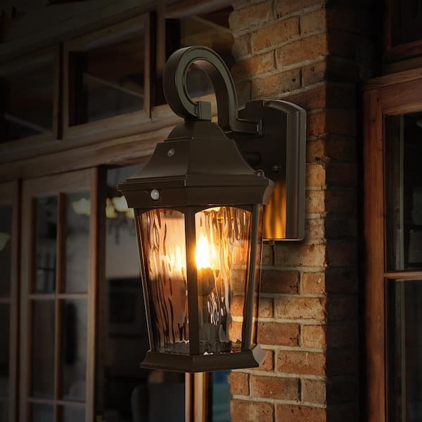 Outdoor Wall Lantern Scrolled Arm Flickering Flame Effect Bronze
