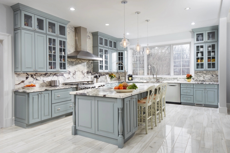 Pale Blue Shaker Kitchen Cabinets with Full Height Marble Backsplash