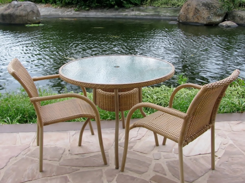 Patio Dining Set Round Textured Glass Tan Woven Armchairs Pond View