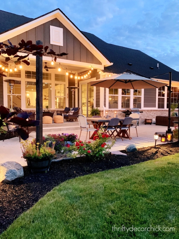 Patio Lighting Setup with Large Cantilever Umbrella at Dusk