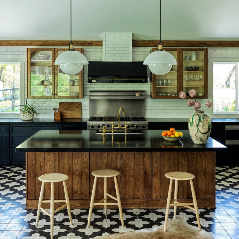 Patterned Floor Tile in Black and White with Wood Island and Brass Faucet