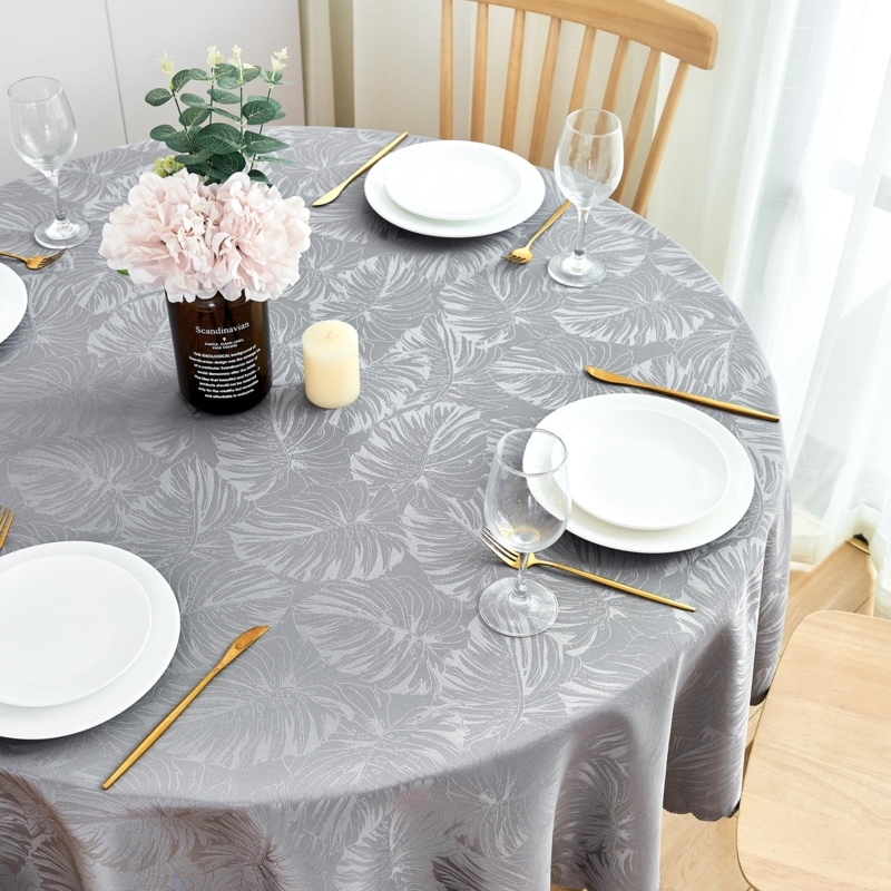 Round Tablecloth with Grey Monstera Leaf Pattern and Scalloped Edge.