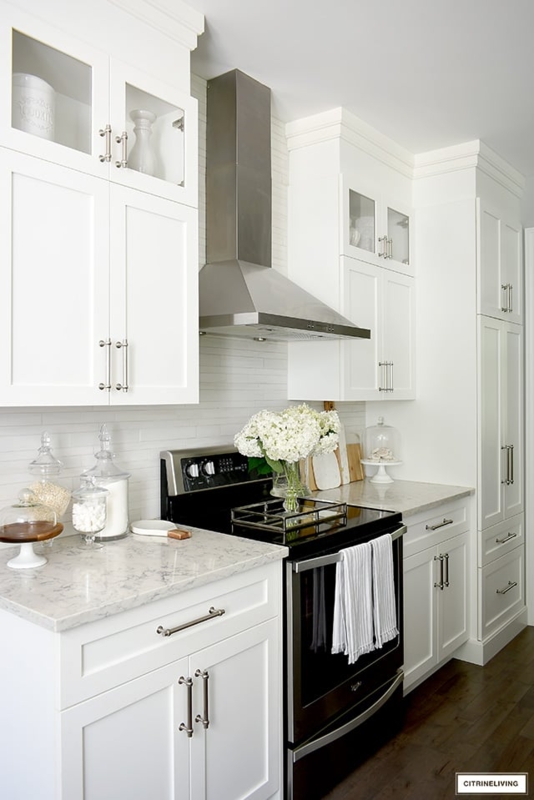 Shaker Kitchen with Glass Front Upper Cabinets and Brushed Nickel Pulls