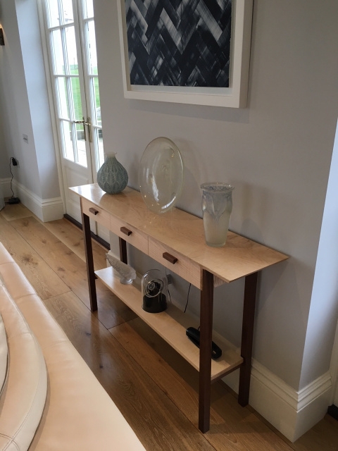 Slim Minimalist Console Table with Mixed Wood Tones and Three Drawers