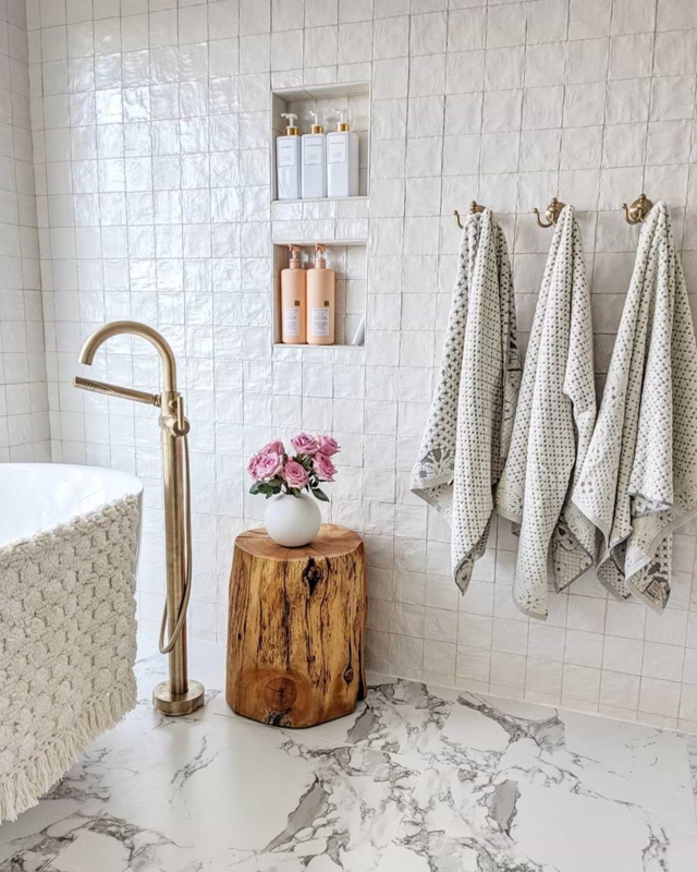 Textured Zellige Tiles: Organic Bathroom Corner with Raw Wood Stump