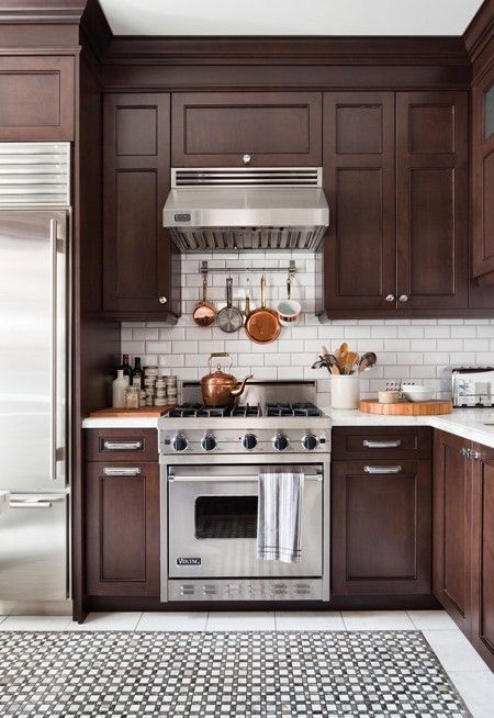 Traditional Kitchen Design: Dark Cabinets, Copper Cookware Accents