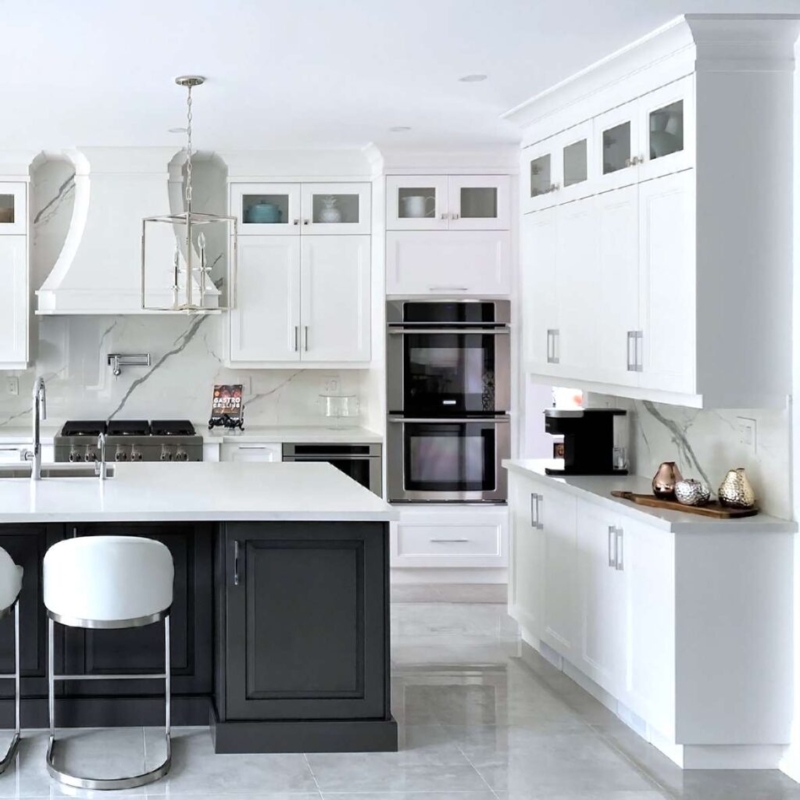 Transitional Kitchen with Contrasting Island and Marble Slab Backsplash