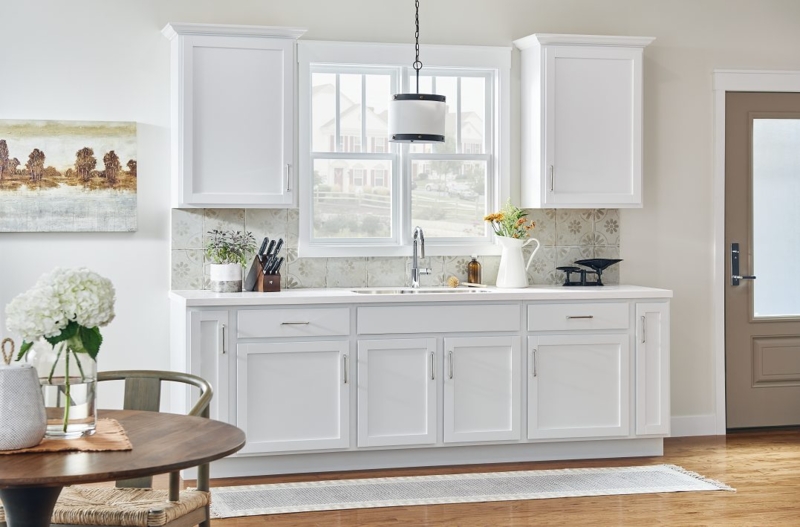 Transitional Kitchen with Patterned Tile Backsplash and Gooseneck Faucet