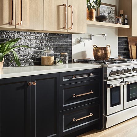 Two Tone Kitchen Cabinets Copper Hardware Textured Black Tile Backsplash